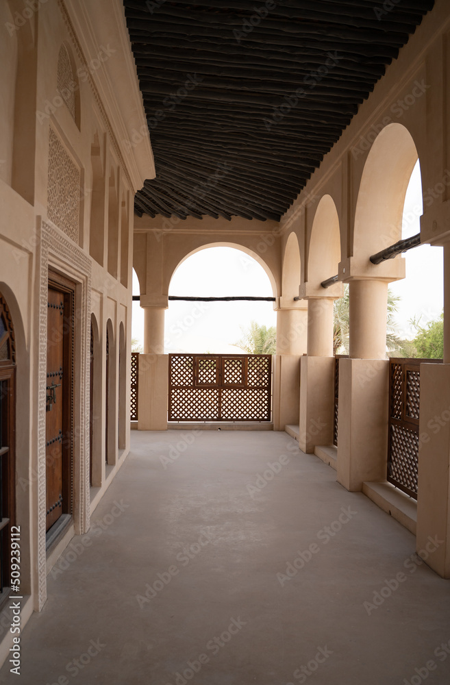 traditional qatari house exterior at the national qatar museum.