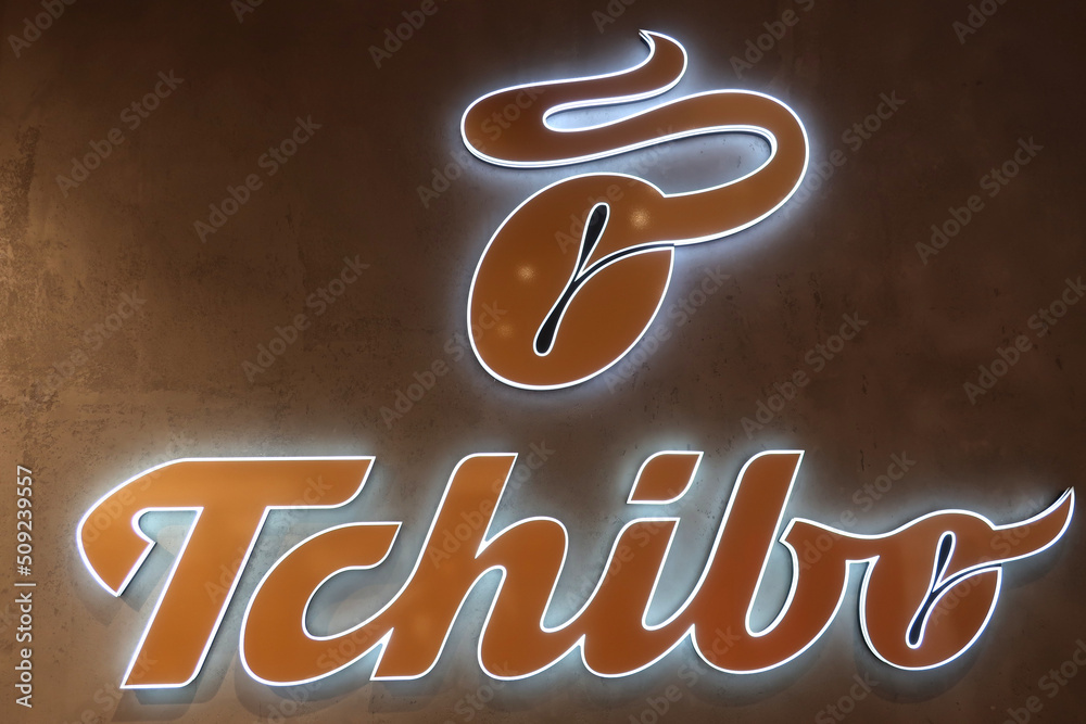 Tchibo signage, logo, emblem on the wall of a German chain of coffee ...