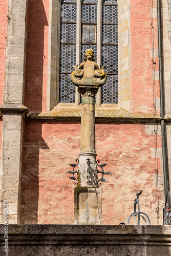 Rothenburg ob der Tauber, Germany. Beautiful old fountain at U. Schmiedgasse photo