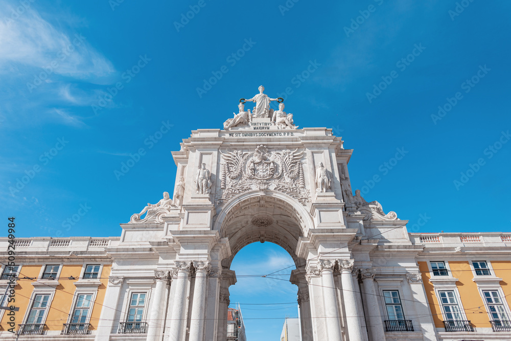 Arco da rua Augusta. Sunny Lisbon city with ancient building and blue sky. Portugal