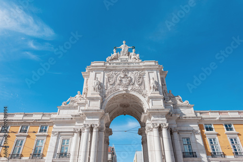 Arco da rua Augusta. Sunny Lisbon city with ancient building and blue sky. Portugal