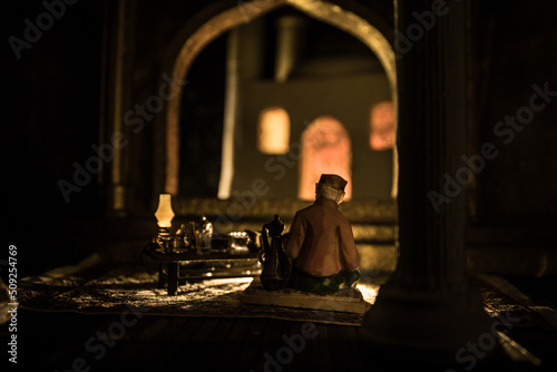 A realistic Arabian interior miniature with window and columns. Meals are served before sunrise called Suhur. Festive greeting card, invitation for Muslim holy month Ramadan Kareem.