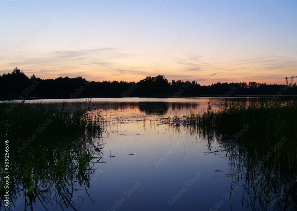 Lake landscape at night.