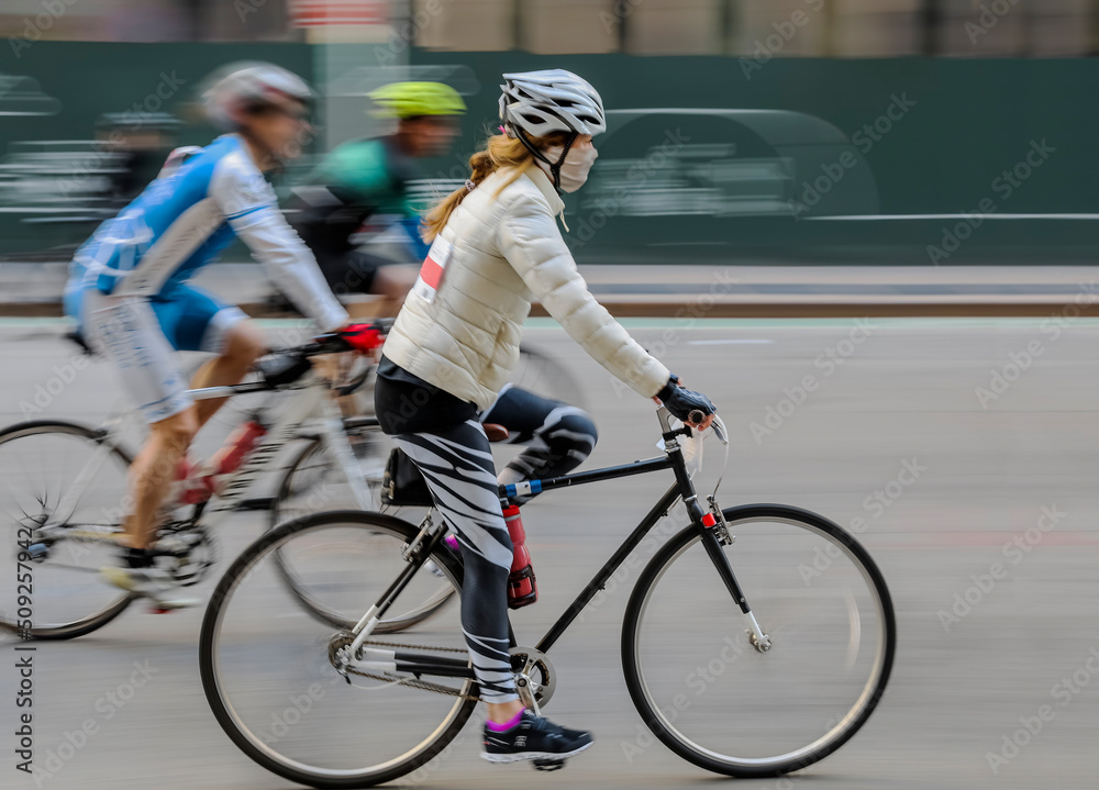 Obraz premium Blurred image of a group of cyclists