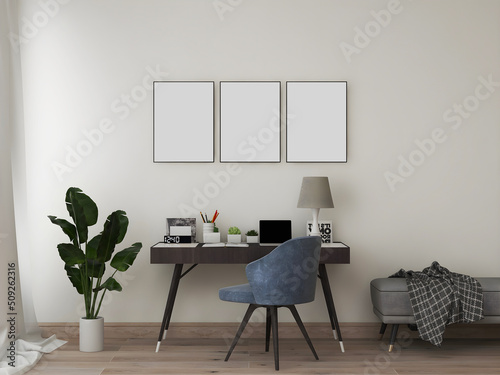 Desk room or home office mockup with 3 blank frames, desk and object, blue chair, plant, and sofa. 3d rendering. 3d illustration
