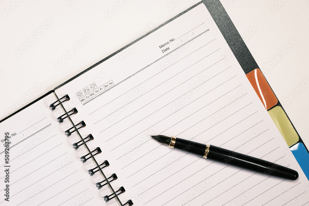 A fountain pen and paper for notes and memos. For new plans for the new year. Pen and paper for studying. A fountain pen and paper for notes and memos. For new plans for the new year. Pen and paper for studying.