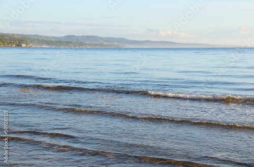 Layer of gentle waves of the ocean in the morning sun  Sogod  Cebu  Philippines