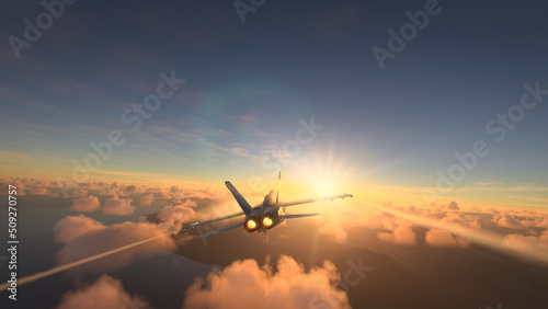 Militar aircraft flying over the clouds in amazing sunset photo