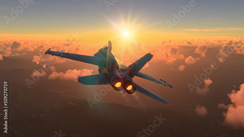 Militar aircraft flying over the clouds in amazing sunset