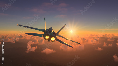 Militar aircraft flying over the clouds in amazing sunset