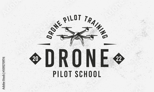 Drone, UAV pilot school logo, poster. Drone pilot training. Drone trendy logo with vintage drone icon. Vector emblem template.