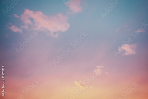 Sunset sky with few purple clouds, sky only background