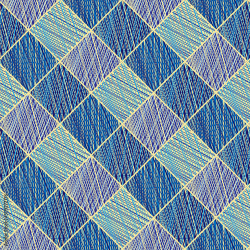 Seamless pattern of blue and gold hatched diamonds. Abstract geometric backdrop. Colorful texture for textile design