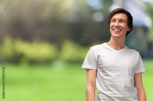 Relaxed man in a t-shirt on fresh air outdoors