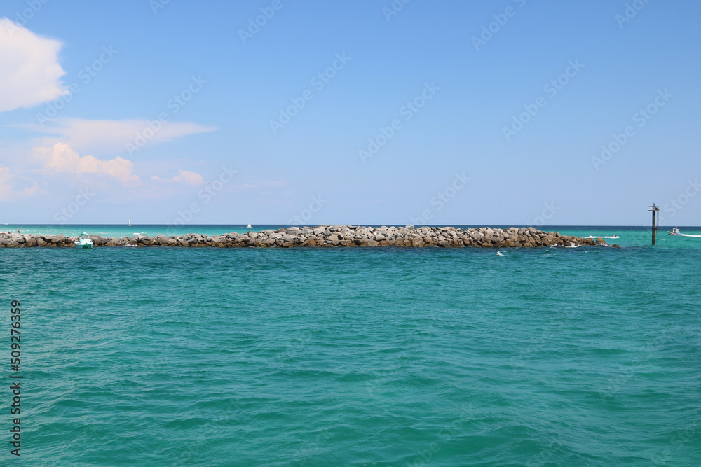 Rocky Outcropping in Blue Ocean Rocky Outcropping in Blue Ocean
