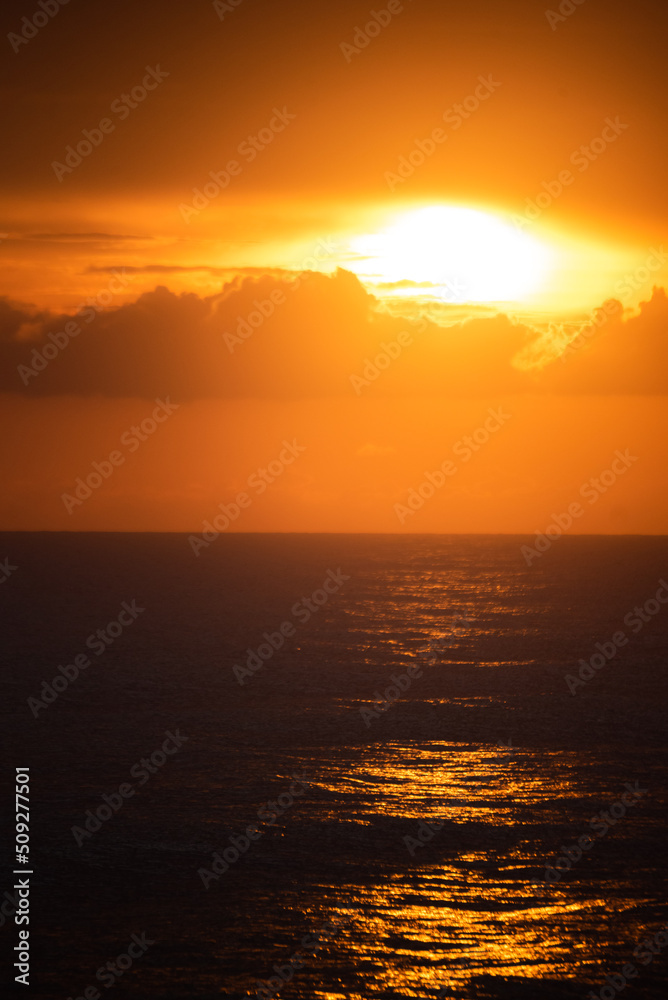 soft wave on beach with sunset time