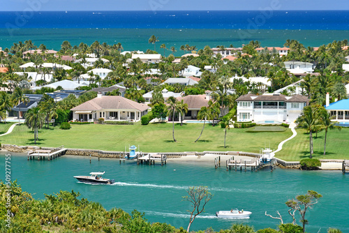 Aerial view of luxury waterfront homes along the intracoastal near Jupiter Inlet from the lighthouse in Jupiter, Florida in Palm Beach County