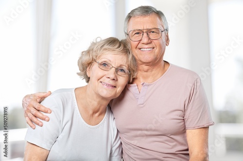Portrait of happy beautiful senior family couple in love smiling at camera,