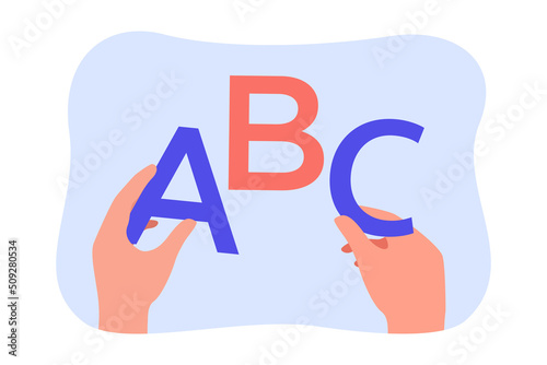 Hands holding big letters of English alphabet. Hands of child learning ABC flat vector illustration. Education, development, language concept for banner, website design or landing web page