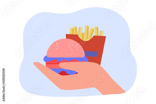 French fries and burger in human hand flat vector illustration. Person eating fast food or unhealthy food. Nutrition, health concept for banner, website design or landing web page