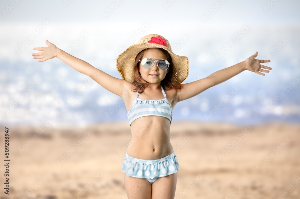 Funny kid girl playing outdoor surprised emotional child, family vacations Funny kid girl playing outdoor surprised emotional child, family vacations