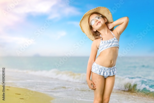 Funny kid girl playing outdoor surprised emotional child, family vacations © BillionPhotos.com