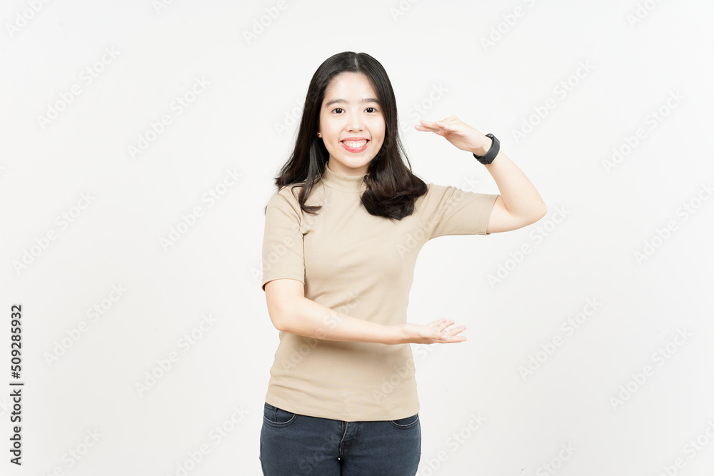 Measuring and Showing Big Sign Product Of Beautiful Asian Woman Isolated On White Background Measuring and Showing Big Sign Product Of Beautiful Asian Woman Isolated On White Background