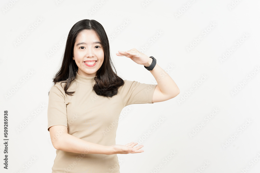 Measuring and Showing Big Sign Product Of Beautiful Asian Woman Isolated On White Background Measuring and Showing Big Sign Product Of Beautiful Asian Woman Isolated On White Background