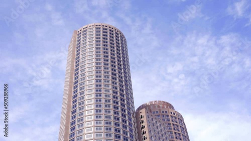 One International Place Building In Boston, Massachusetts Against Bright Sunny Sky. low angle photo