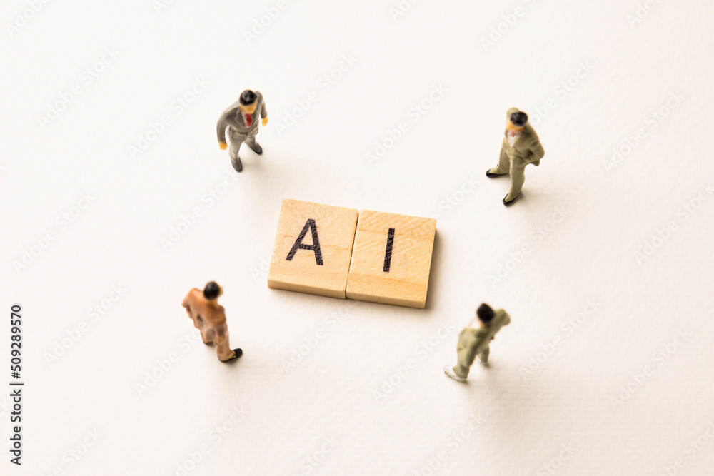 businessman figures at ai words businessman figures at ai words