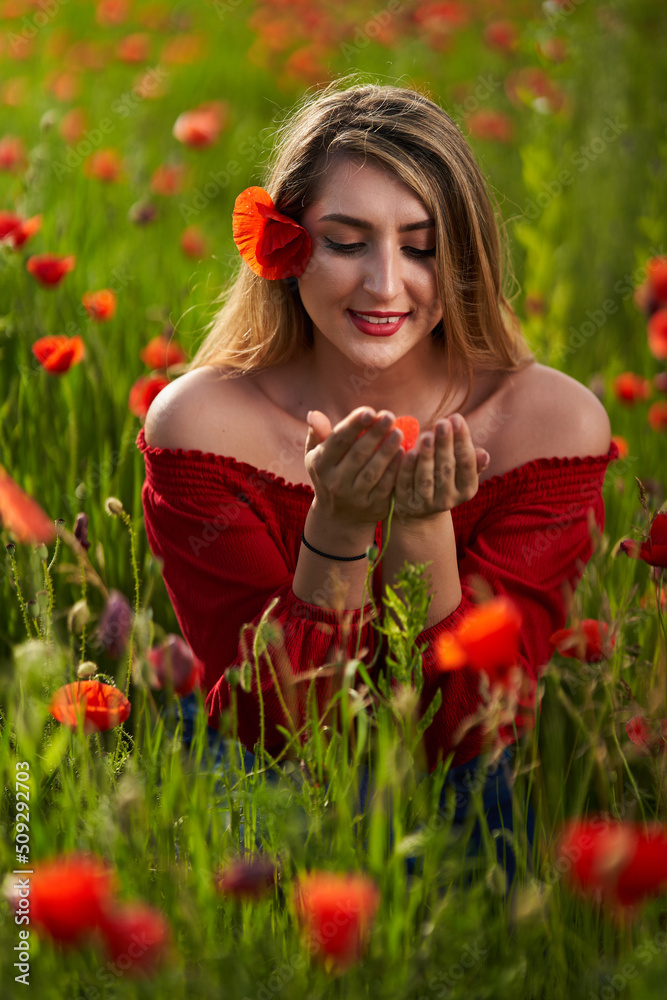 Size plus woman in a poppy field Size plus woman in a poppy field