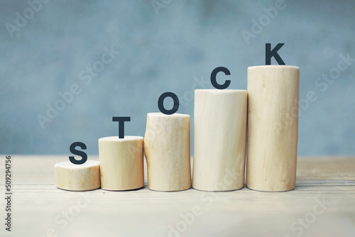 stock goes up. money concept. word wood type.