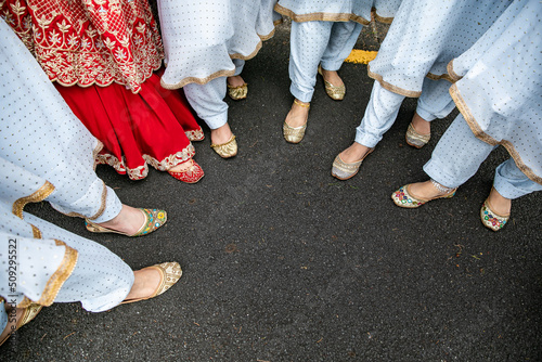 Indian Punjabi bride's red wedding shoes close up