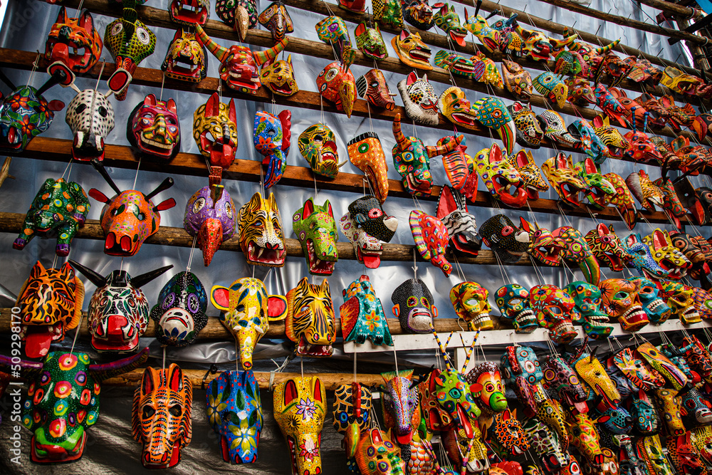 wood masks from different animals and representations