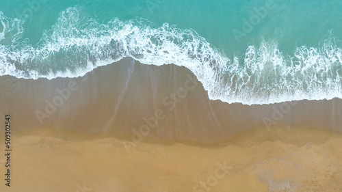 Summer seascape with Turquoise water as Coast background by aerial view