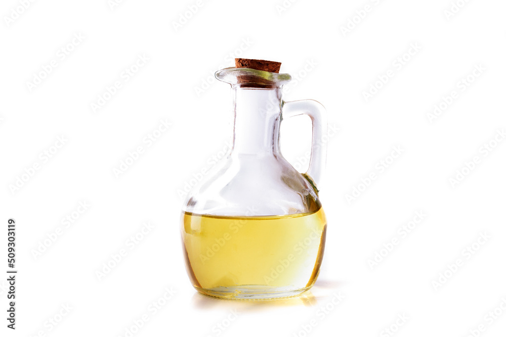 Yellow sunflower, hemp or olive oil in a bottle with a wooden stopper on a white background. Yellow sunflower, hemp or olive oil in a bottle with a wooden stopper on a white background.