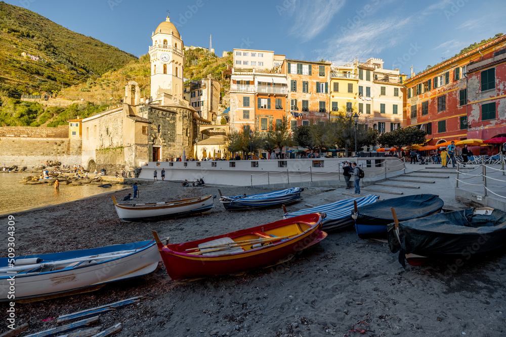 Bay with boats at Vernazza town on the northwestern coast of Italy. Famous village at Cinque Terre National Park