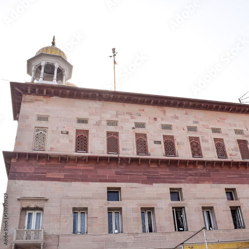 Gurudwara Sis Ganj Sahib is one of the nine historical Gurdwaras in Old Delhi in India, Sheesh Ganj Gurudwara in Chandni Chowk, opposite Red Fort in Old Delhi India photo