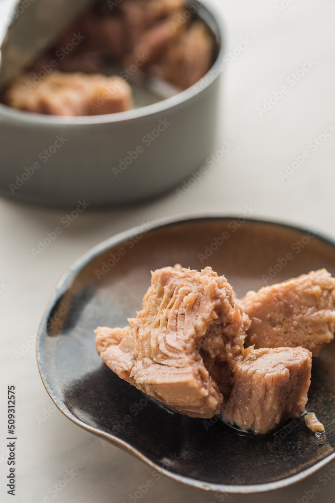 the close-up of Olive oil tuna canned food the close-up of Olive oil tuna canned food