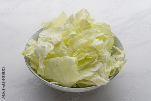 A bowl of clean cabbage leaves