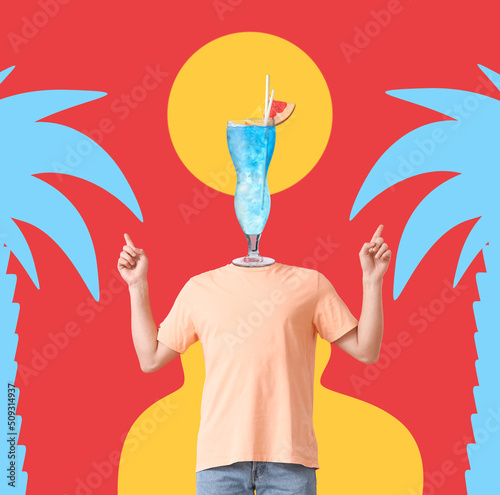 Man with glass of tasty Blu...