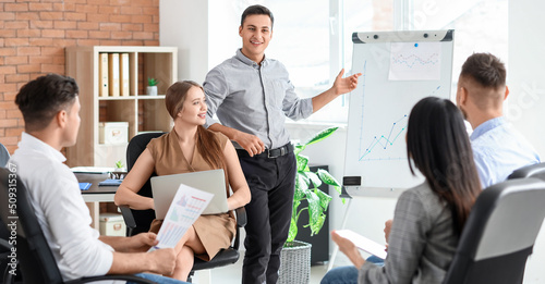 Young businessman giving pr...