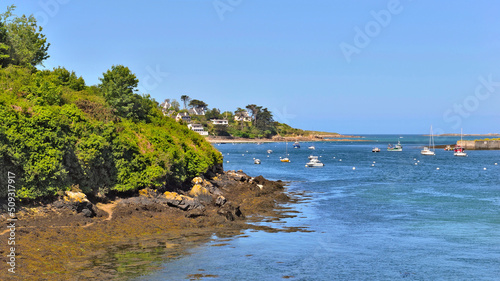 sea view with boats on the coast in the aber Benoit in Brittany - France