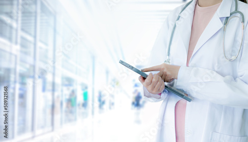 Doctor touching tablet for medical at hospital. Medical technology and futuristic concept