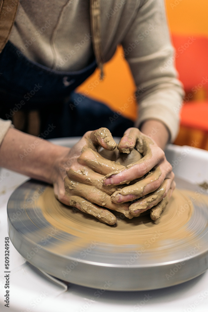 Making Pottery On Spinning Wheel