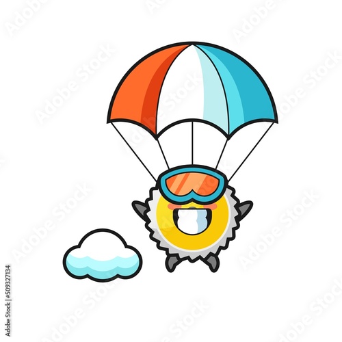 Fototapeta Naklejka Na Ścianę i Meble -  saw blade mascot cartoon is skydiving with happy gesture