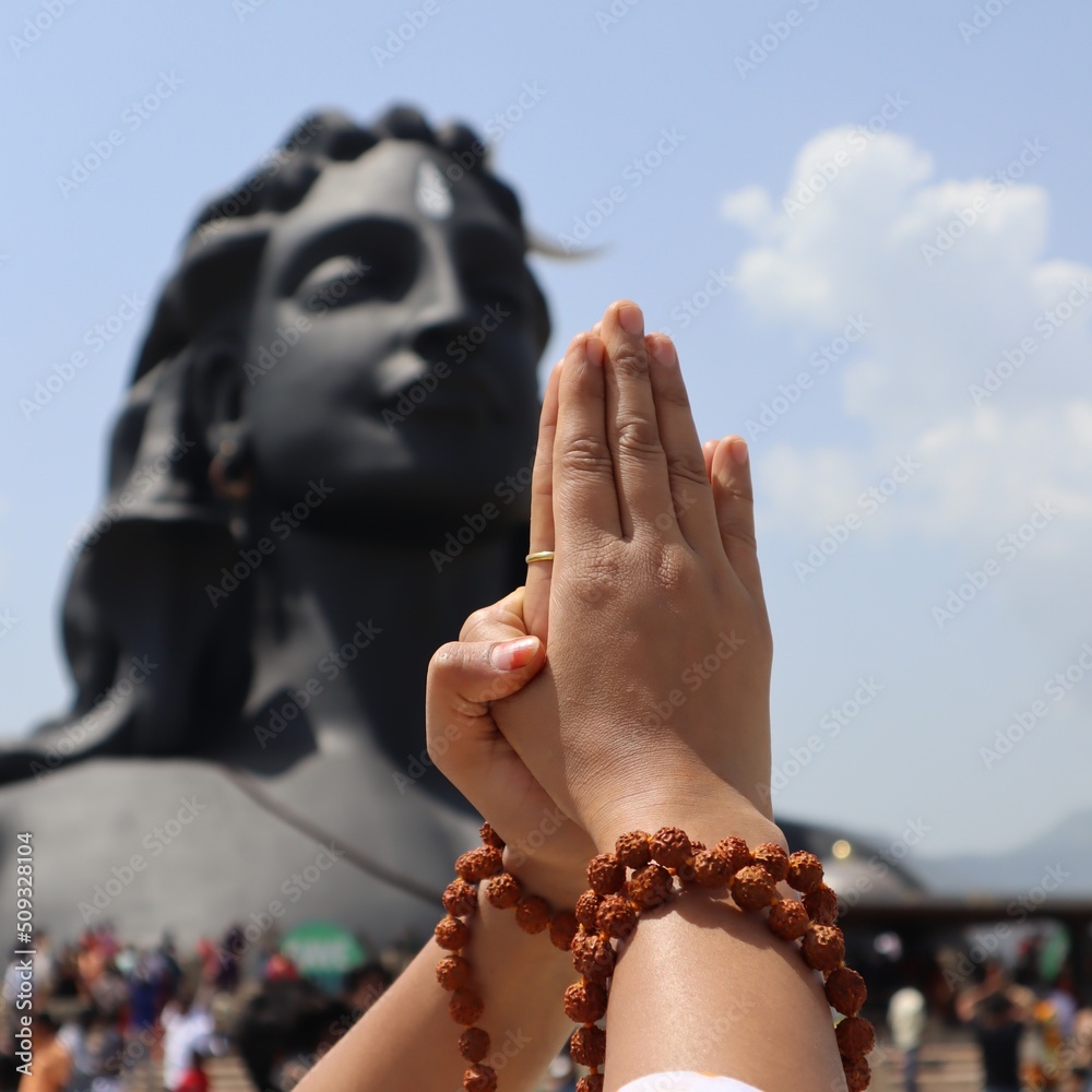 Hands Surrounded By Rudraksha And Joined Together For Prayer In Front