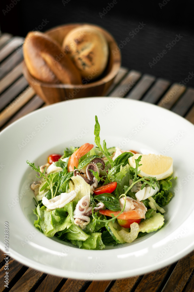 organic mixed green salad with fresh seafood in portugal