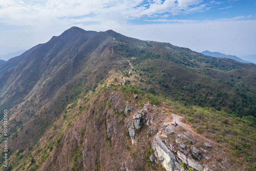 Fototapeta premium Epic view of hiker man on the mountain of Pat Sin Leng, Tai Po