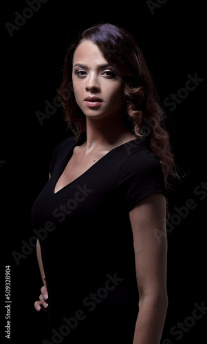 Beautiful woman with evening make-up in black dress